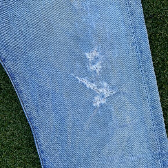 Levi's Men's 501 Distressed Light Wash Denim Jeans - Picture 3 of 7